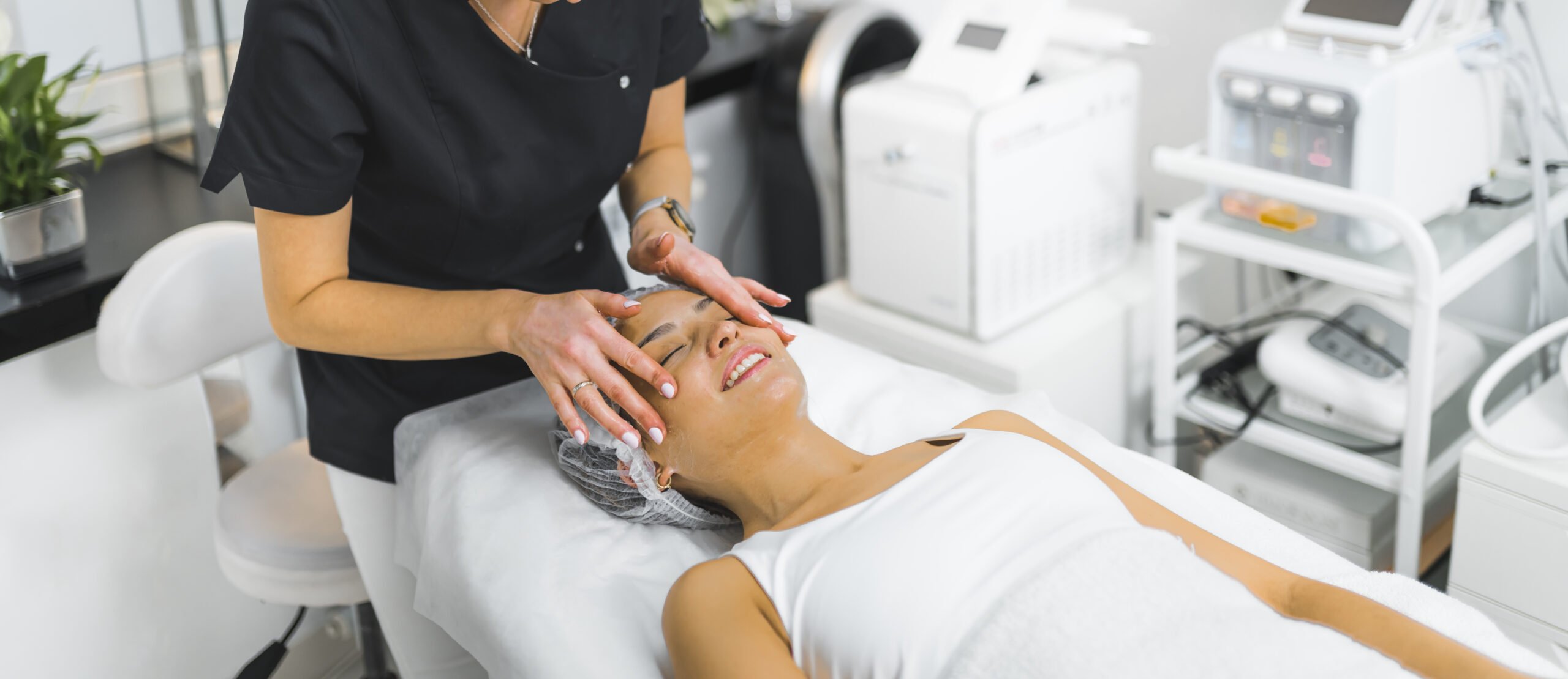 Latin woman getting a facial massage. High quality photo